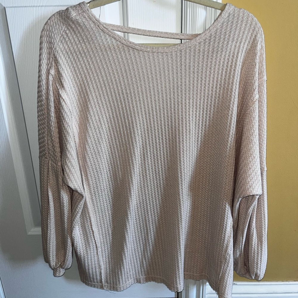 Francesca’s open back blouse